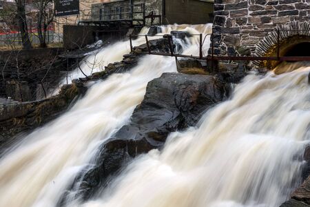 Molndal, Sweden - December 26, 2017: Molndal river waterfall in the old industrial  part of Molndalのeditorial素材