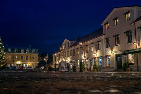 Vadstena, Sweden- December 16, 2017:  Christmas ornaments and light by Storgatan street, witch is a...