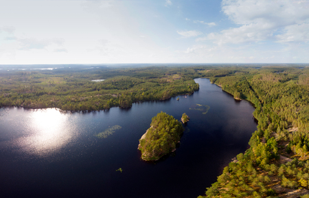 Evergreen landscape with a lakeの写真素材