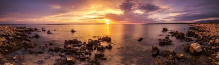 Panoramic view of the beautiful sunset over the island of Pag, Croatiaの写真素材