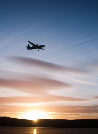 sunset flyingの写真素材