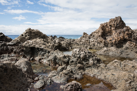 Volcanic rocks in Playa San Juan - Tenerifeの写真素材
