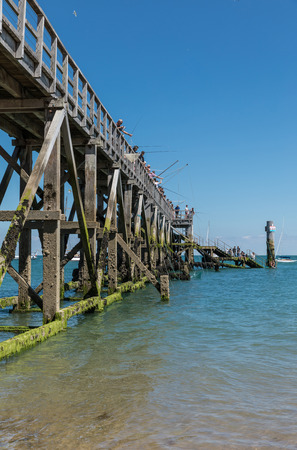 Fishermen on the landing stage of Noirmoutier (France)のeditorial素材