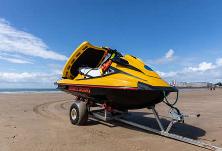 Coast guard rescue vehicle on the sand of Les Sables d'Olonne beach (Vendee, France)