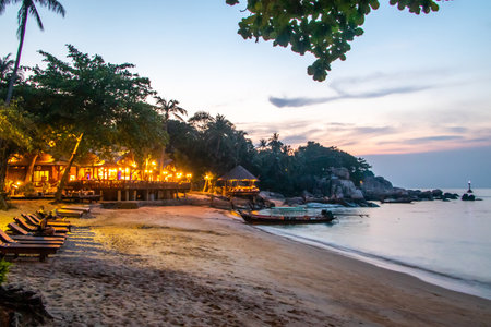 A beach, large rocks and calm sea just after sunset, Ko Tao, Thailandの写真素材
