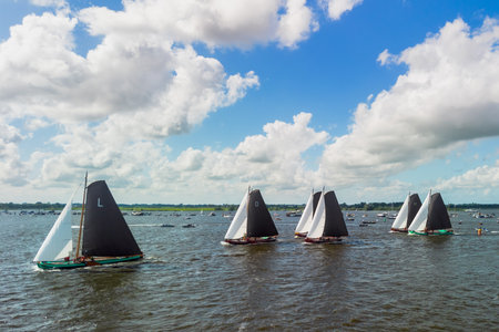 Traditional sailing boats on the Nieuwe Maas river in Holland