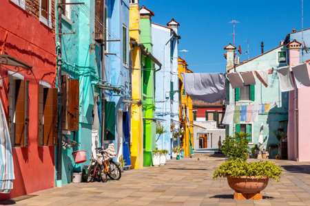 Colorful houses in Burano island, Venice, Italy. Burano island is one of the most popular tourist destinations in Venice.の写真素材