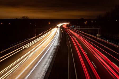 highway in the dark, headlight lightsの写真素材
