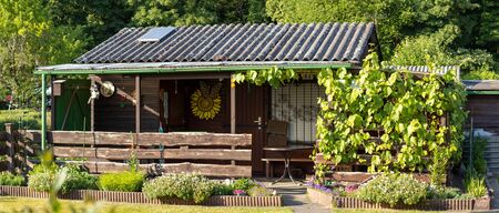 view into a allotment garden with a tiny house, springの写真素材