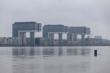 Cologne, NRW, Germany, 02 07 2021, crane houses of Cologne at high water, cloudy weatherのeditorial素材