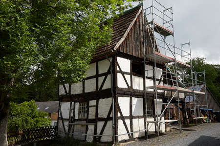 Herdringen, NRW, Germany, 27 05 2022, half-timbered house with scaffolding for renovation workのeditorial素材