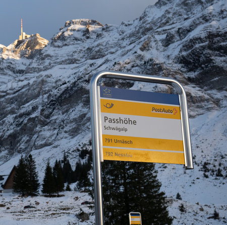 Sign of the bus stop Schwaegalp Passhoehe of the company Postauto, Switzerlandのeditorial素材