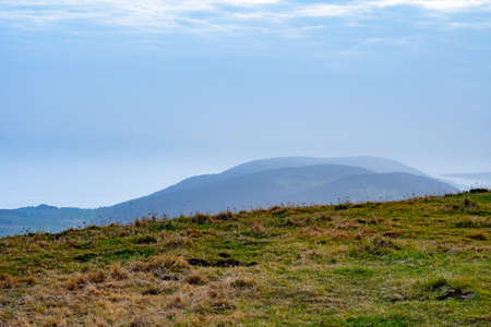 View from Swiss Jura chain over the sea of fog of Lake Biel on an autumn dayの写真素材