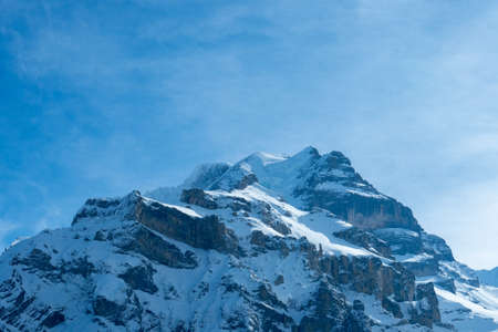 View from Muerren, a village in Switzerland, to the mountains Eiger and Moenchの写真素材