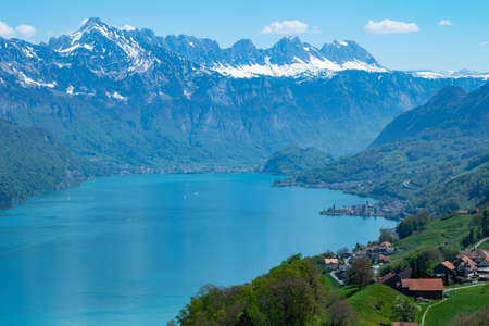 View over Walensee, a famous lake in Switzerland, to the surrounding mountainsの写真素材