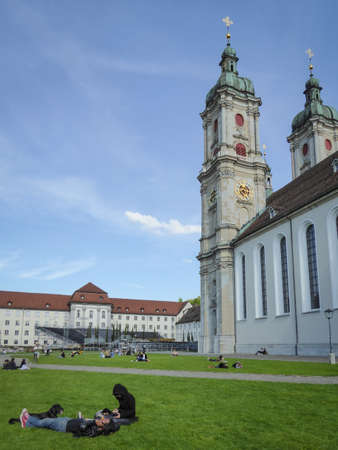 St. Gallen, Switzerland - May 21st 2017: Lively green space at Stiftskircheのeditorial素材