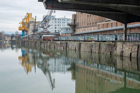 Basel, Switzerland - March 21st 2021: Harbour dock and bulk handlingのeditorial素材