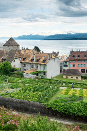 View over the public gardens and rooftops of Nyon, Switzerland and Lac Leman