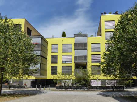 Zurich, Switzerland - July 12th 2015: Modern housing buildings in binz, located in the outskirts of...