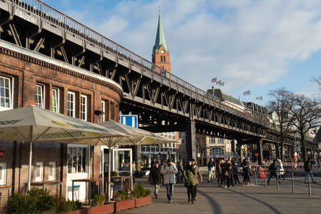 Hamburg, Germany - December 29th 2017: Metro station Landungsbruecken, in the background the French churchのeditorial素材