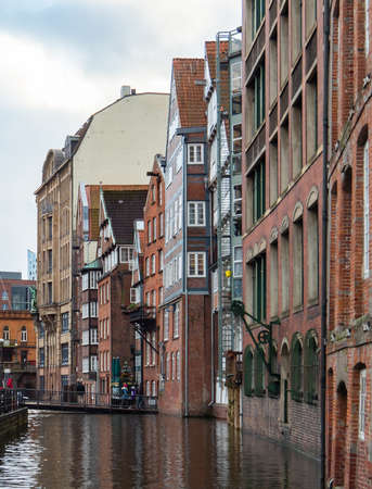 Hamburg, Germany - January 1st 2018: View along the brick facades of Nikolaifleet
