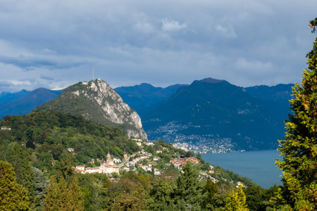 Lugano, Switzerland - October 6th 2021: View to the summit of Monte San Salvatore and the city in the backgroundの写真素材