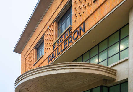 Paris, France - November 15th 2021: Brick facade of piscine Pailleron in the Eastern City.のeditorial素材