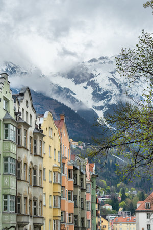 Innsbruck, Austria - April 16th 2018: Colorful historic facades in the city centre.のeditorial素材