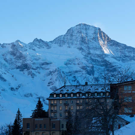 Muerren, Switzerland - February 26th 2022: View over the famous historic Alpine Palace hotel towards Breithornのeditorial素材