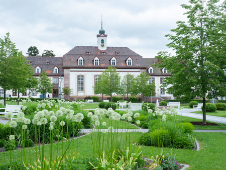 Koenigsfeld, Germany - May 27th 2022: Beautiful garden and protestant church in the centreのeditorial素材