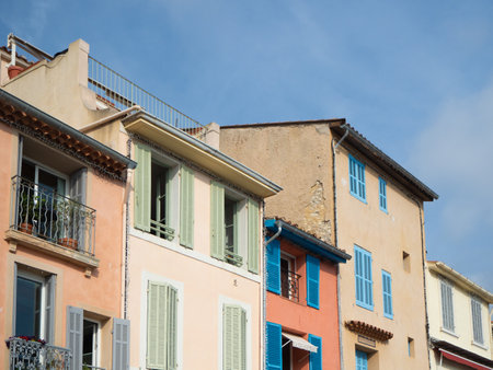 Cassis, France - May 18th 2022: Colorful historic facades in the village city centre.のeditorial素材