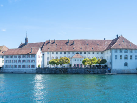 Solothurn, Switzerland - April 17th 2022: View over the Aare river towards the historic hospital buildingのeditorial素材