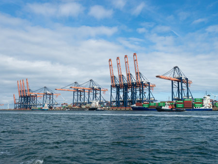 Rotterdam, Netherlands - August 4th 2023: Detail view of a container handling system at Europoort harbour.のeditorial素材
