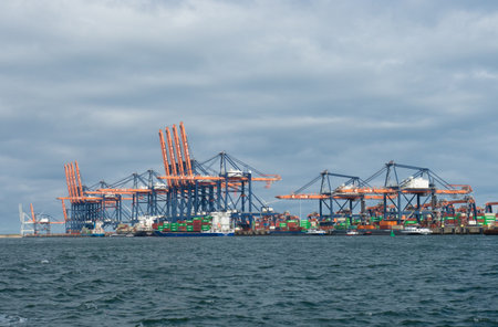 Rotterdam, Netherlands - August 4th 2023: Detail view of container handling systems at Europoort harbour.のeditorial素材