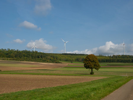 Schwaebische Alb, Germany - September 30th 2023: Beautiful landscapes with wind wheels on hillsの写真素材