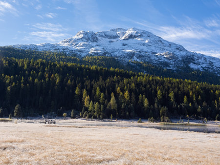 St. Moritz, Switzerland - October 6th 2024: Idyllic lake Lej da Staz in the morning sunlight