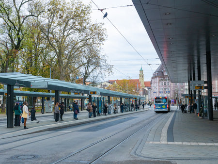 Augsburg, Germany - November 18th 2023: A bus stopping at Koenigsplatz, the recently renovated public transport node.のeditorial素材