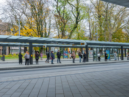 Augsburg, Germany - November 18th 2023: Passengers waiting at Koenigsplatz, the recently renovated public transport node.のeditorial素材