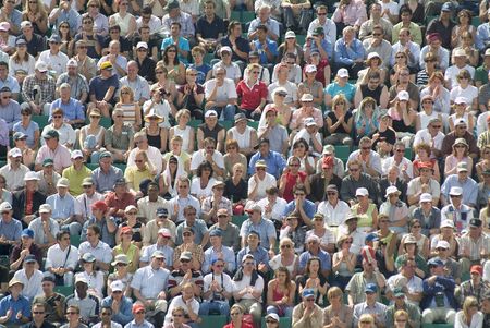 audience in tennis stadium during the French