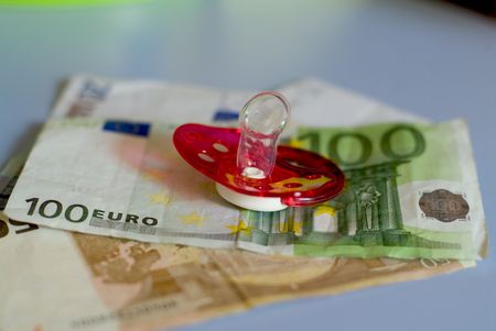 pacifier with eurosの写真素材