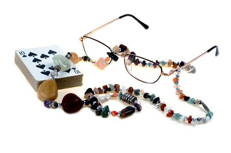 Cards, Nacklace and Glasses on white backgraundの写真素材