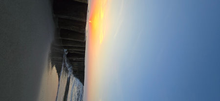 Beautiful sunset on the beach. Panoramic view of the beach.の写真素材