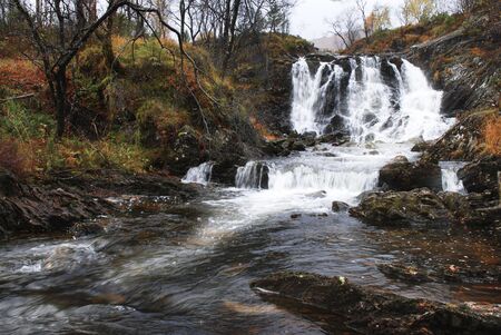 Waterfall in the mountains of Norway during autumn!の写真素材