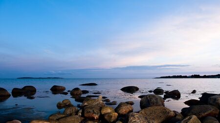 Sunset by the sea in sweden at summerの写真素材
