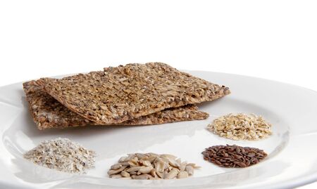 Two healthy whole grain home made crackers and the ingredience.