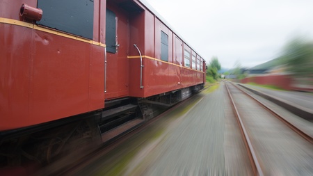 A red old vintage train in speedの写真素材
