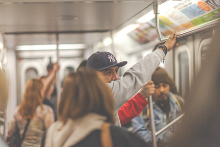 People riding the subway in Newyorkのeditorial素材