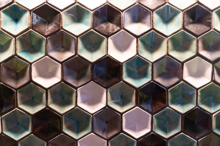 A geometrical pattern with colors and hexagon, lights and shadowsの写真素材