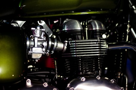Motorcycle engine, metalic background with with green detailsの写真素材