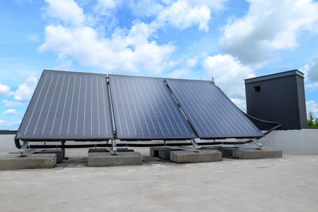 Heat pump and solar collector on the roofの写真素材